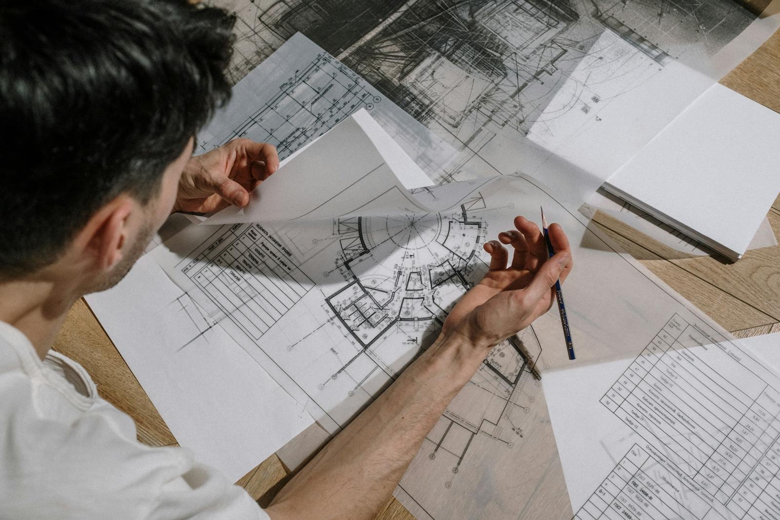 Engineer reviewing project plans